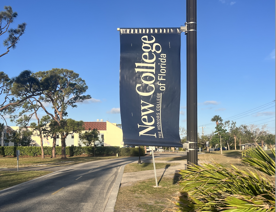 New College New College of Florida banner waving on college campus