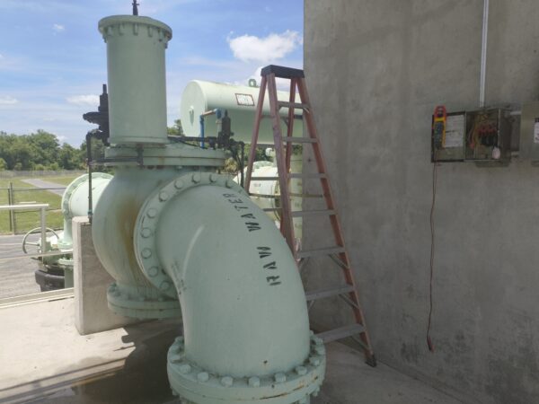 A green pipe labelled 