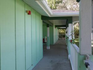 A walkway in front of apartments